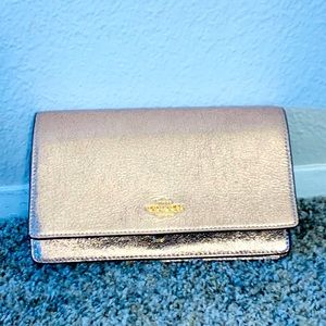 Coach rose gold clutch